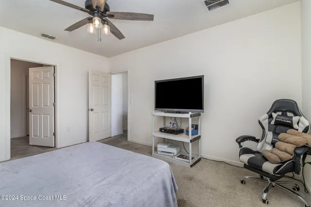 a bathroom with a double vanity sink mirror and double