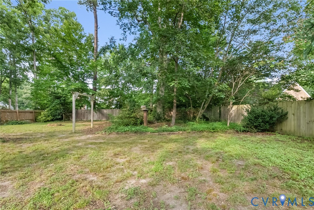 1136 Overbrook Road Petersburg, VA 23805 - Photo 47 of 51 Fenced backyard featuring mature perimeter trees,