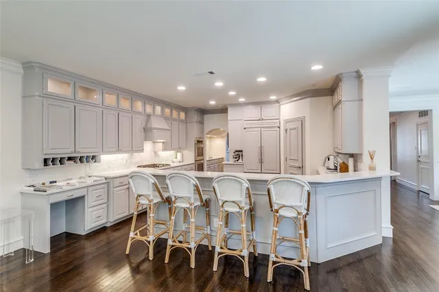 a bed room with a bed and a chandelier