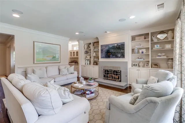 a bathroom with a sink a vanity and a large mirror