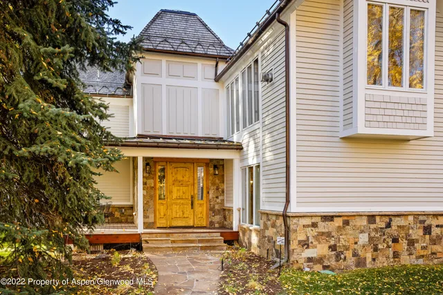 a front view of a house with a outdoor space