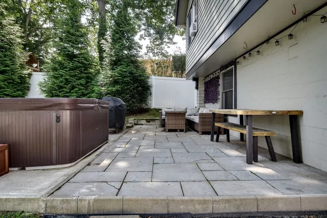 a backyard of a house with seating space