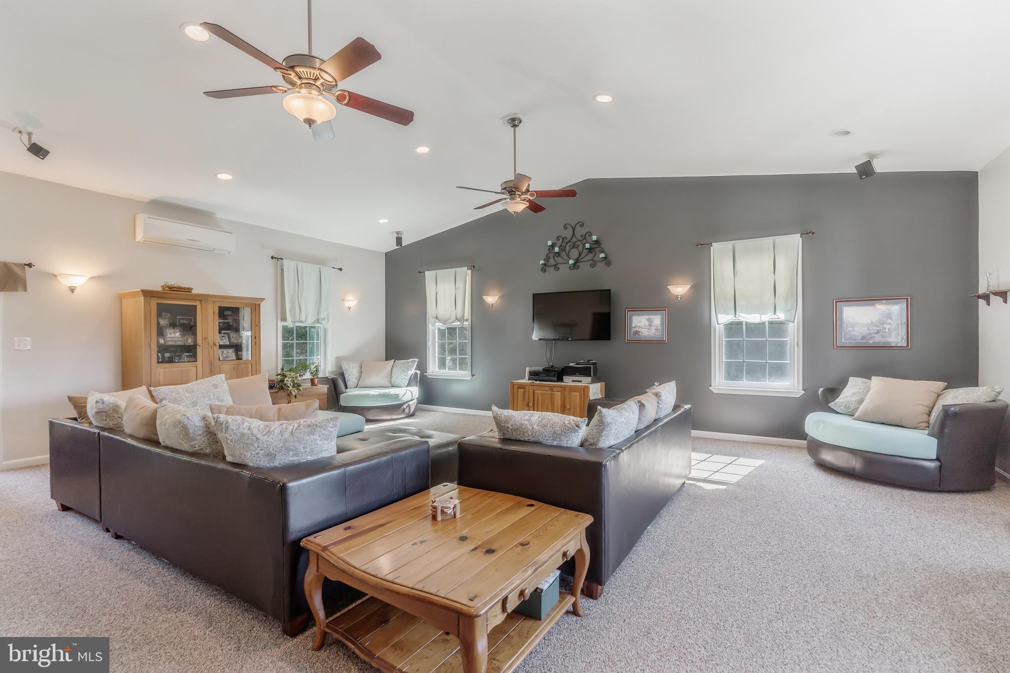 3250 Holland Cliffs Road Huntingtown, MD 20639 - Photo 3 of 48 28' x 24' Great Room with Vaulted Ceilings