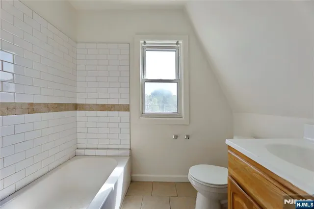 a bathroom with a sink and a bathtub