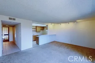 a view of a livingroom with wooden floor