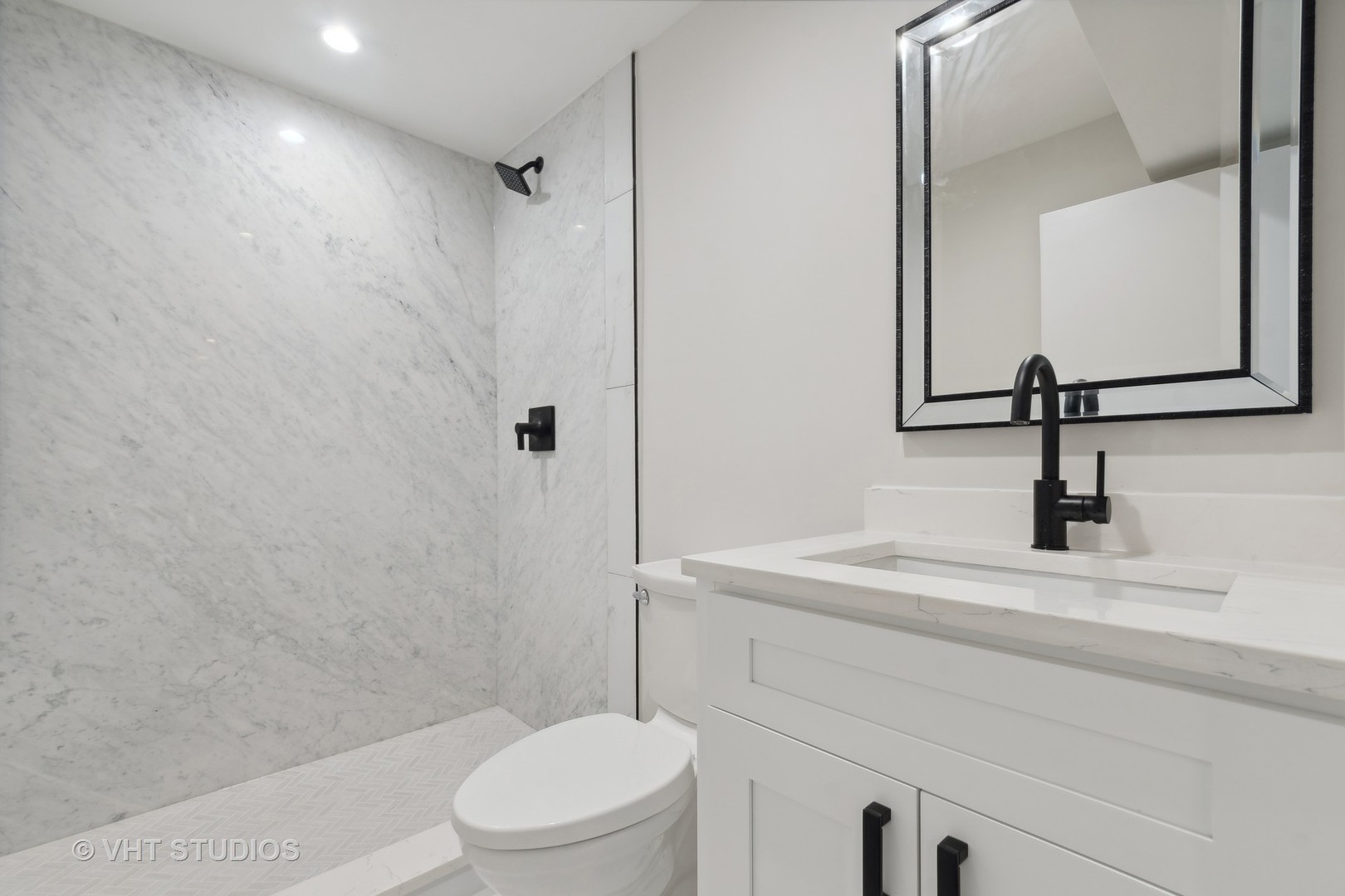 695 Ridge Road Highland Park, IL 60035 - Photo 15 of 23 a bathroom with a sink a toilet and shower