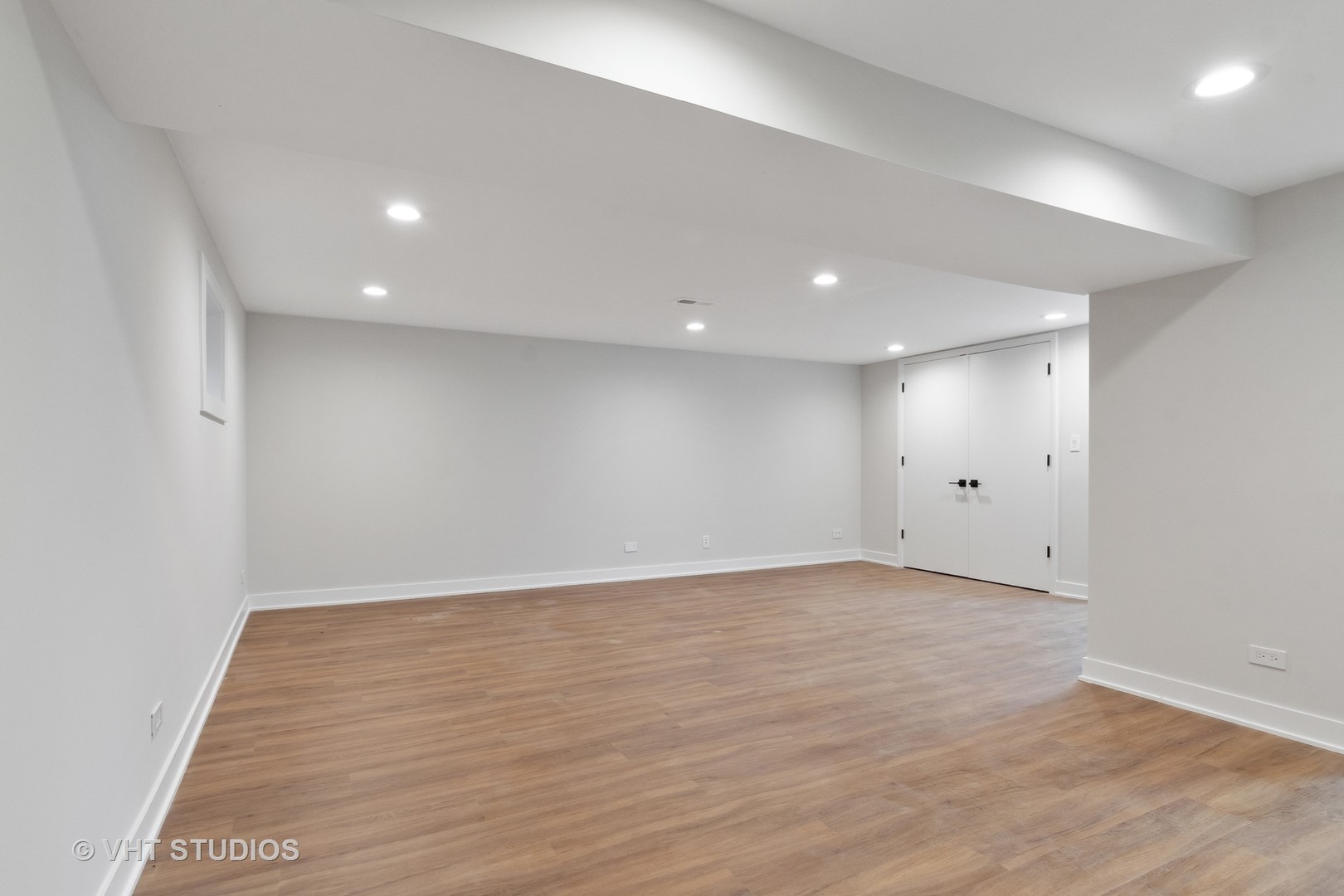 695 Ridge Road Highland Park, IL 60035 - Photo 16 of 23 an empty room with wooden floor and windows