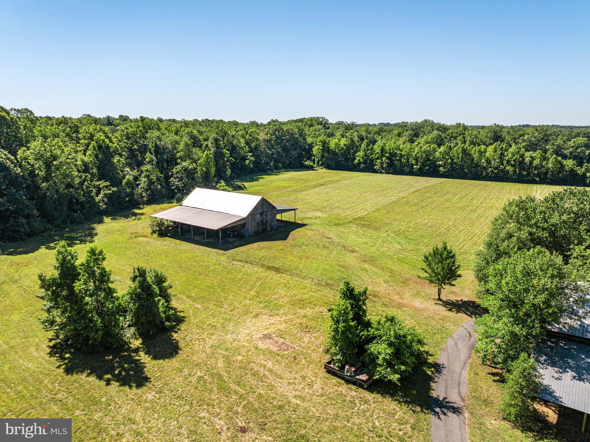 1524 Governor Bridge Road Davidsonville, MD 21035 - Photo 18 of 28 Main barn surrounded by pasture