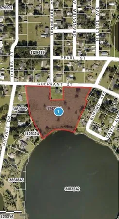 a view of a pool table and chairs