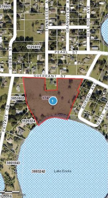 Guerrant Street Umatilla, FL 32784 - Photo 6 of 7 a view of a swimming pool with outdoor seating