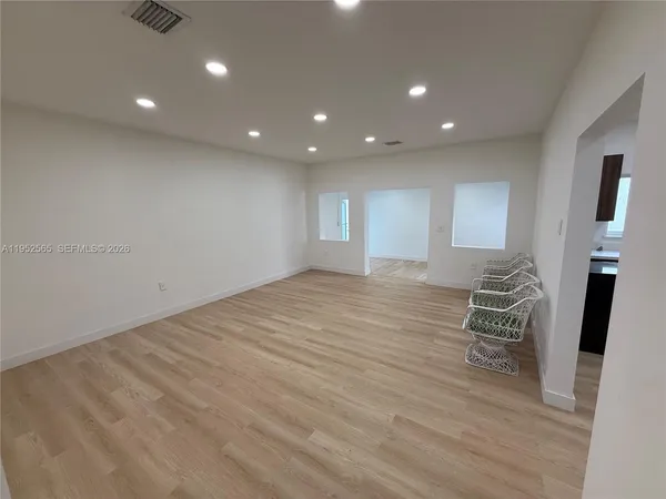 a view of livingroom and hardwood