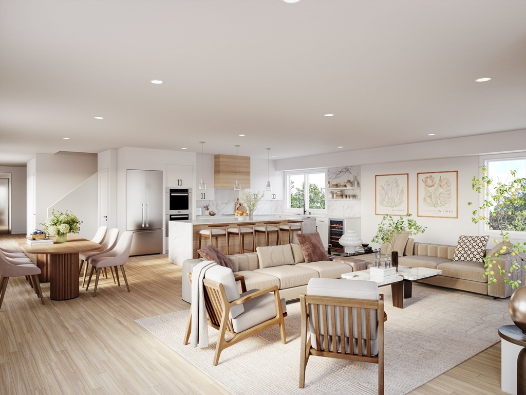 63 Green Street, Unit 2 Brookline, MA 02446 - Photo 8 of 12 a living room with furniture and wooden floor