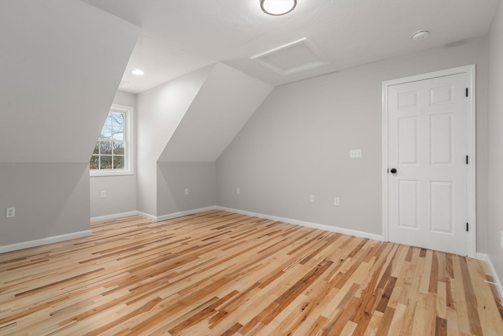 66 A New Boston Road Sturbridge, MA 01566 - Photo 11 of 29 a view of empty room with wooden floor