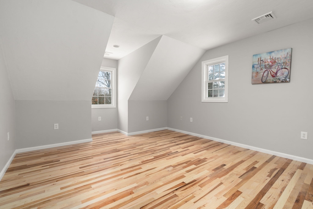 66 A New Boston Road Sturbridge, MA 01566 - Photo 12 of 29 a view of a room with wooden floor and window