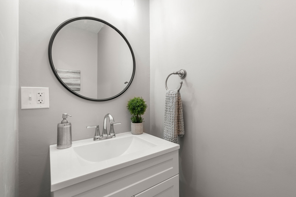 66 A New Boston Road Sturbridge, MA 01566 - Photo 19 of 29 a bathroom with a sink and a mirror