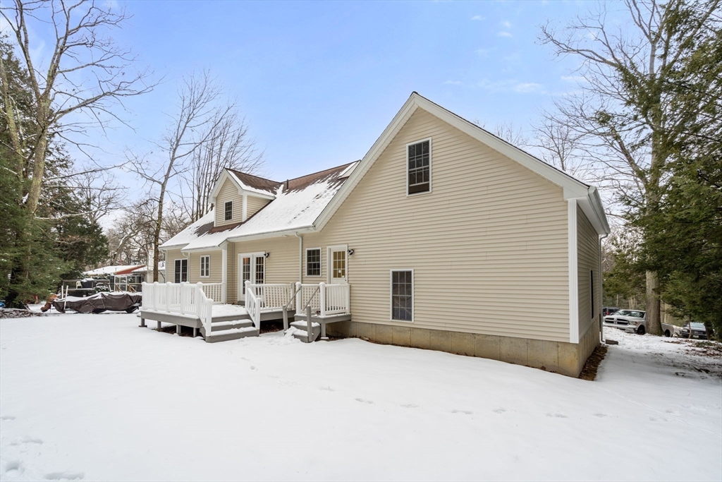 66 A New Boston Road Sturbridge, MA 01566 - Photo 26 of 29 a view of a house with a snow in the yard