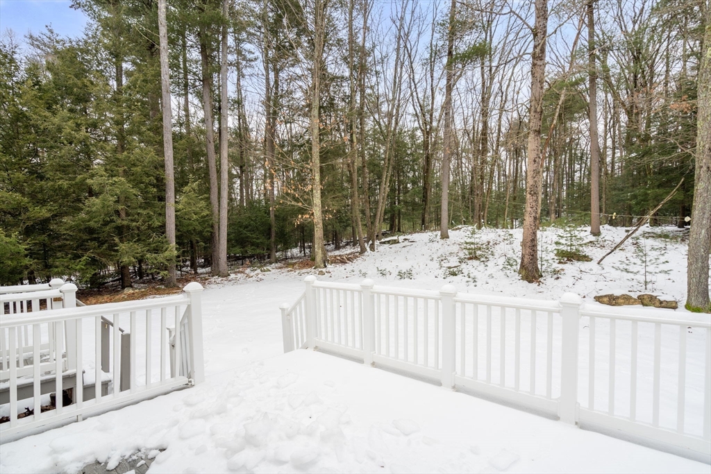 66 A New Boston Road Sturbridge, MA 01566 - Photo 27 of 29 a view of a fence and trees in the back yard