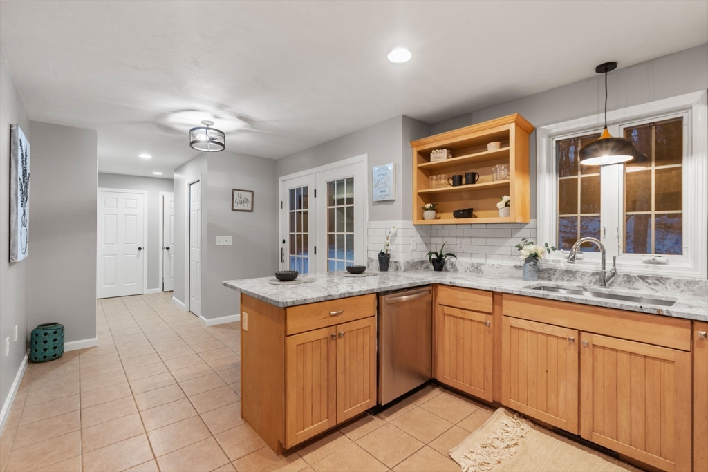66 A New Boston Road Sturbridge, MA 01566 - Photo 8 of 29 a large kitchen with a sink and cabinets