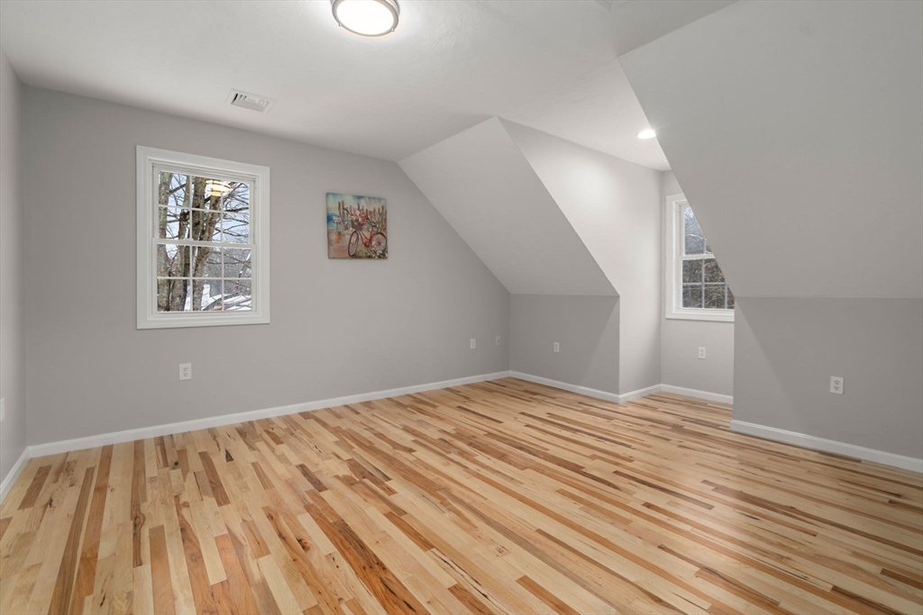 66 A New Boston Road Sturbridge, MA 01566 - Photo 10 of 29 a view of empty room with wooden floor