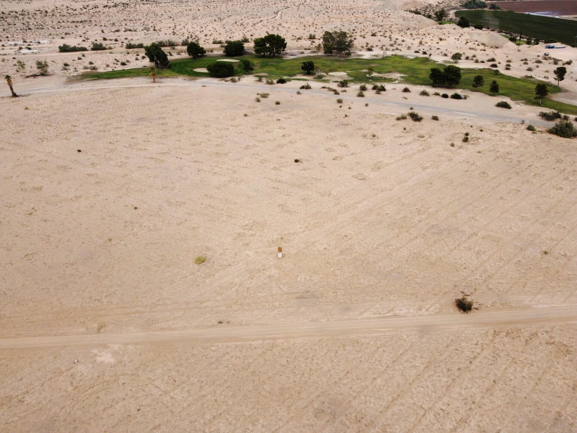 a view of beach and lake