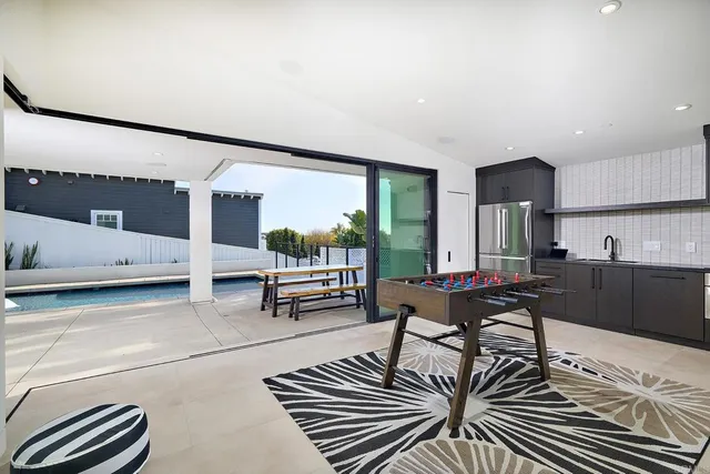 a living room with furniture and a table