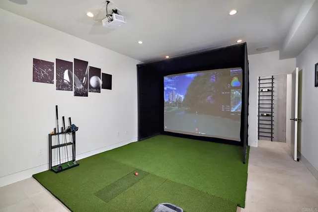 a view of room with a flat screen tv and a projector