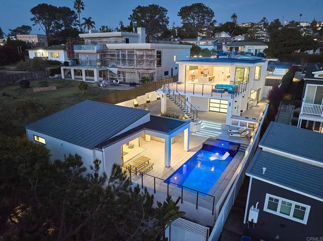 a view of swimming pool from a balcony