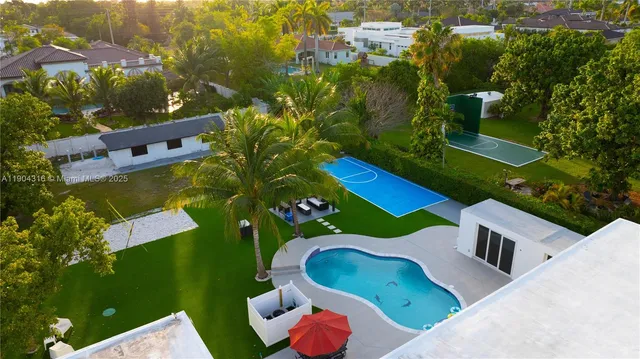 a swimming pool with yard