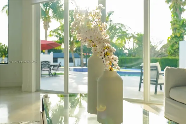 a kitchen with stainless steel appliances a refrigerator sink and microwave