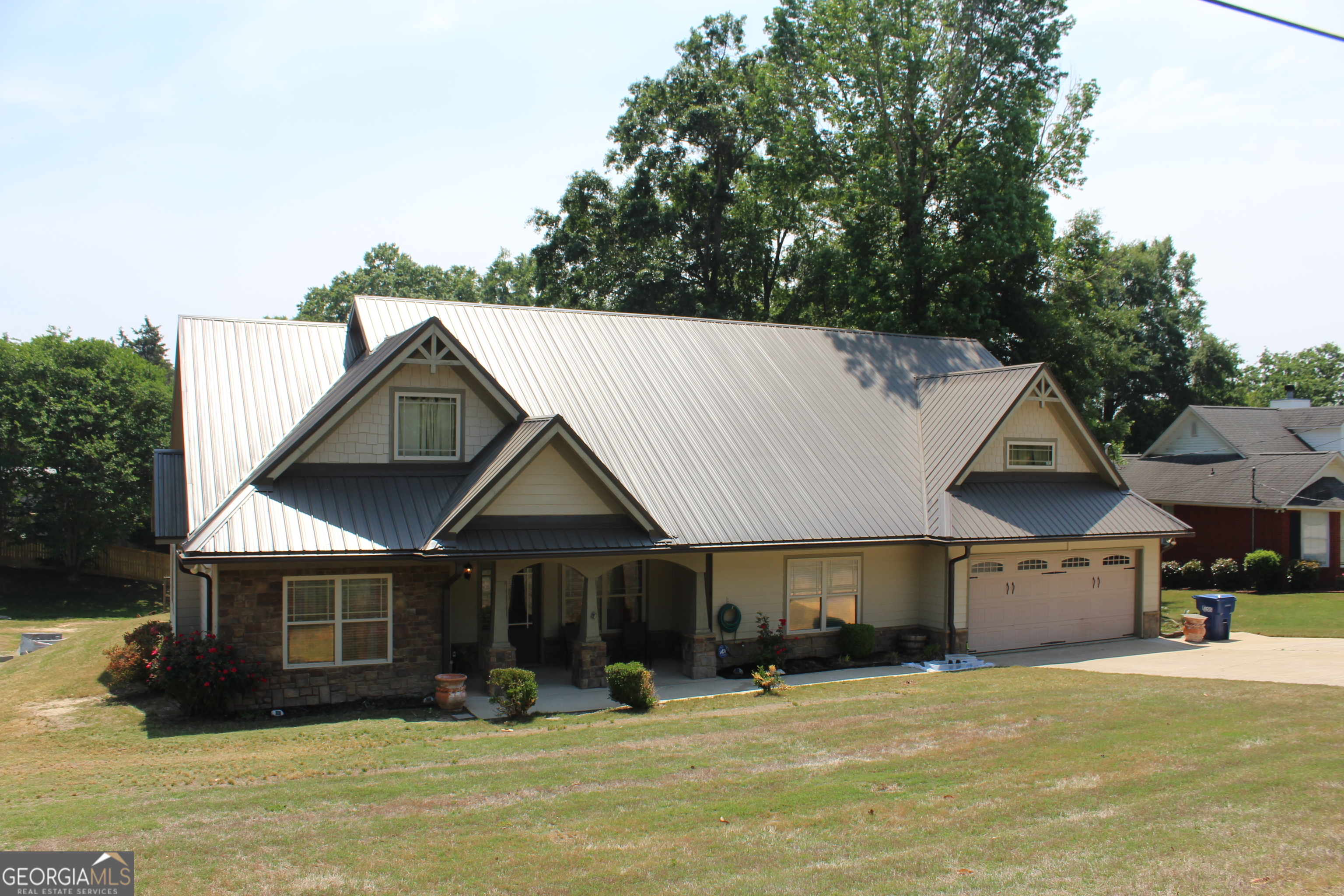 33 Lee Road Phenix City, AL 36870 - Photo 1 of 47 a view of a house with yard and sitting area
