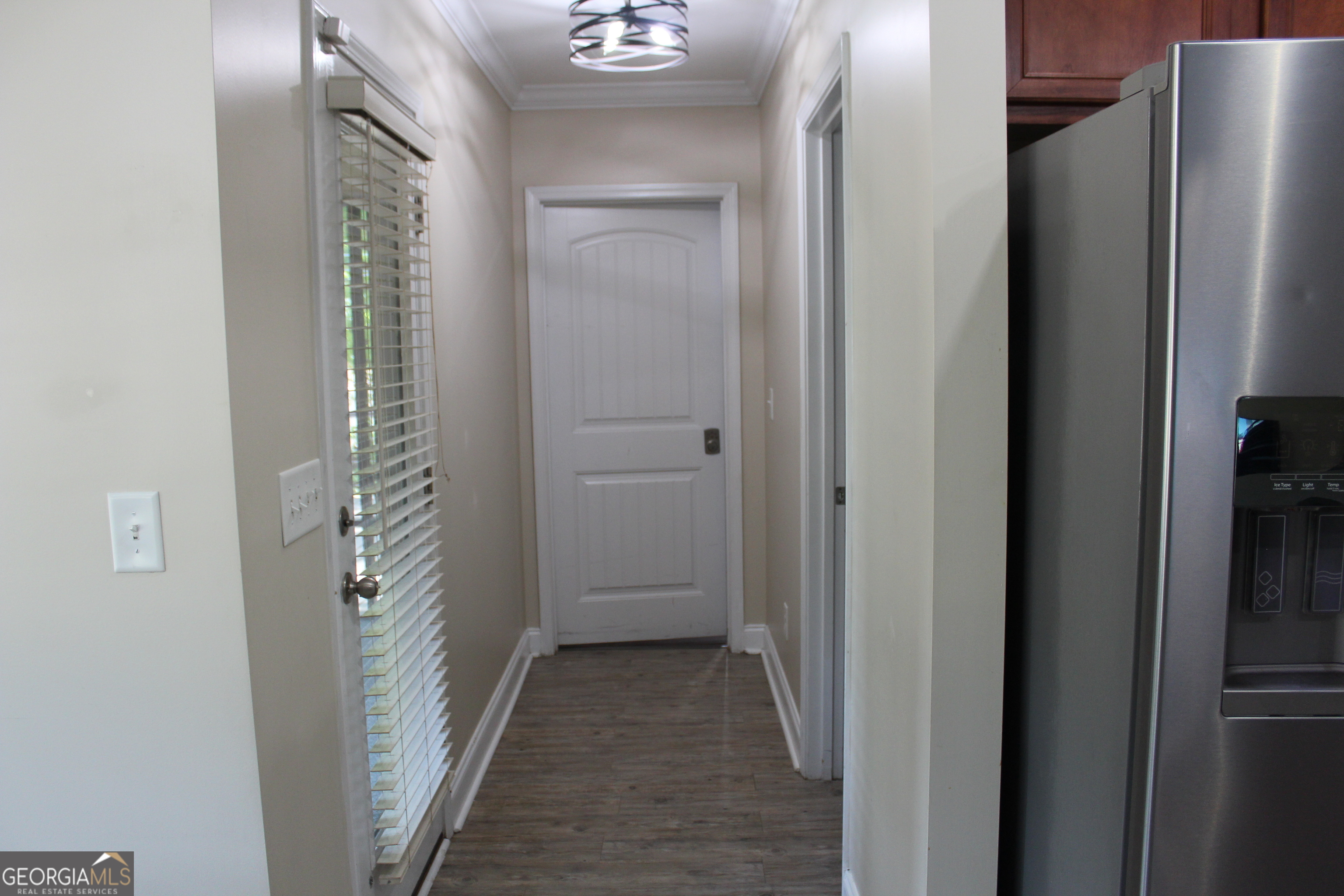 33 Lee Road Phenix City, AL 36870 - Photo 12 of 47 a view of a bathroom from the hallway