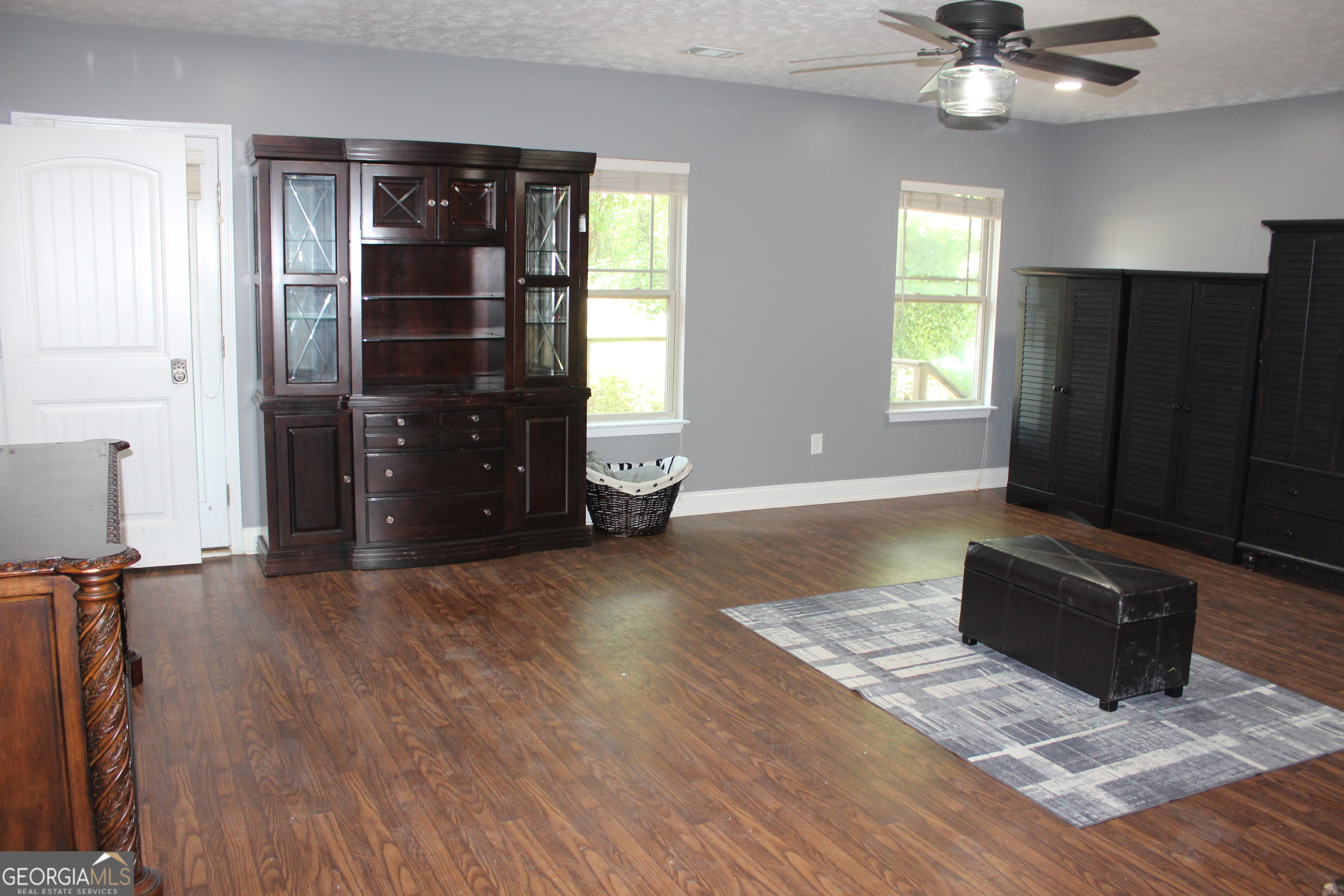 33 Lee Road Phenix City, AL 36870 - Photo 16 of 47 a living room with furniture and a ceiling fan