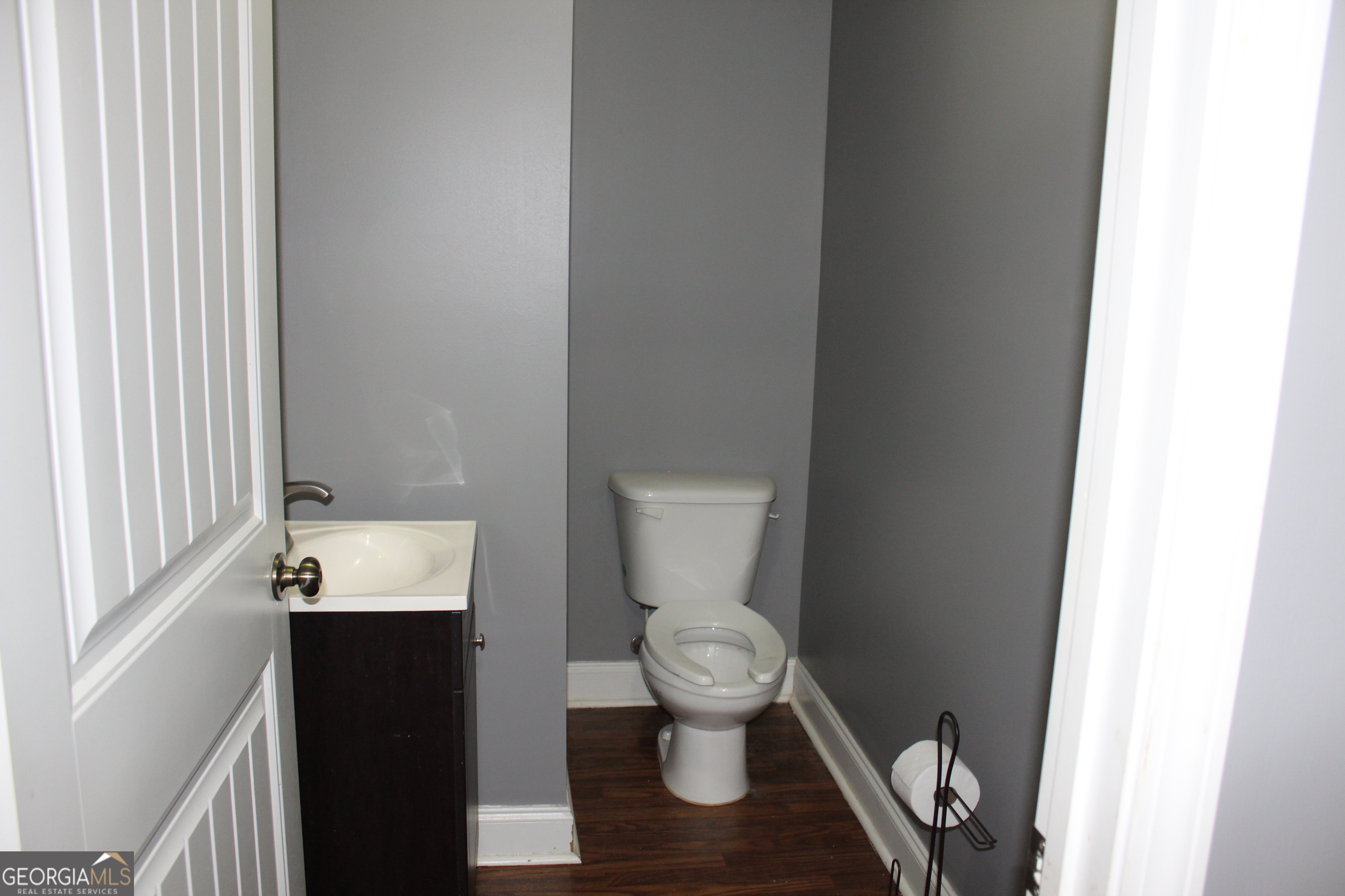 33 Lee Road Phenix City, AL 36870 - Photo 18 of 47 a bathroom with a toilet and a sink