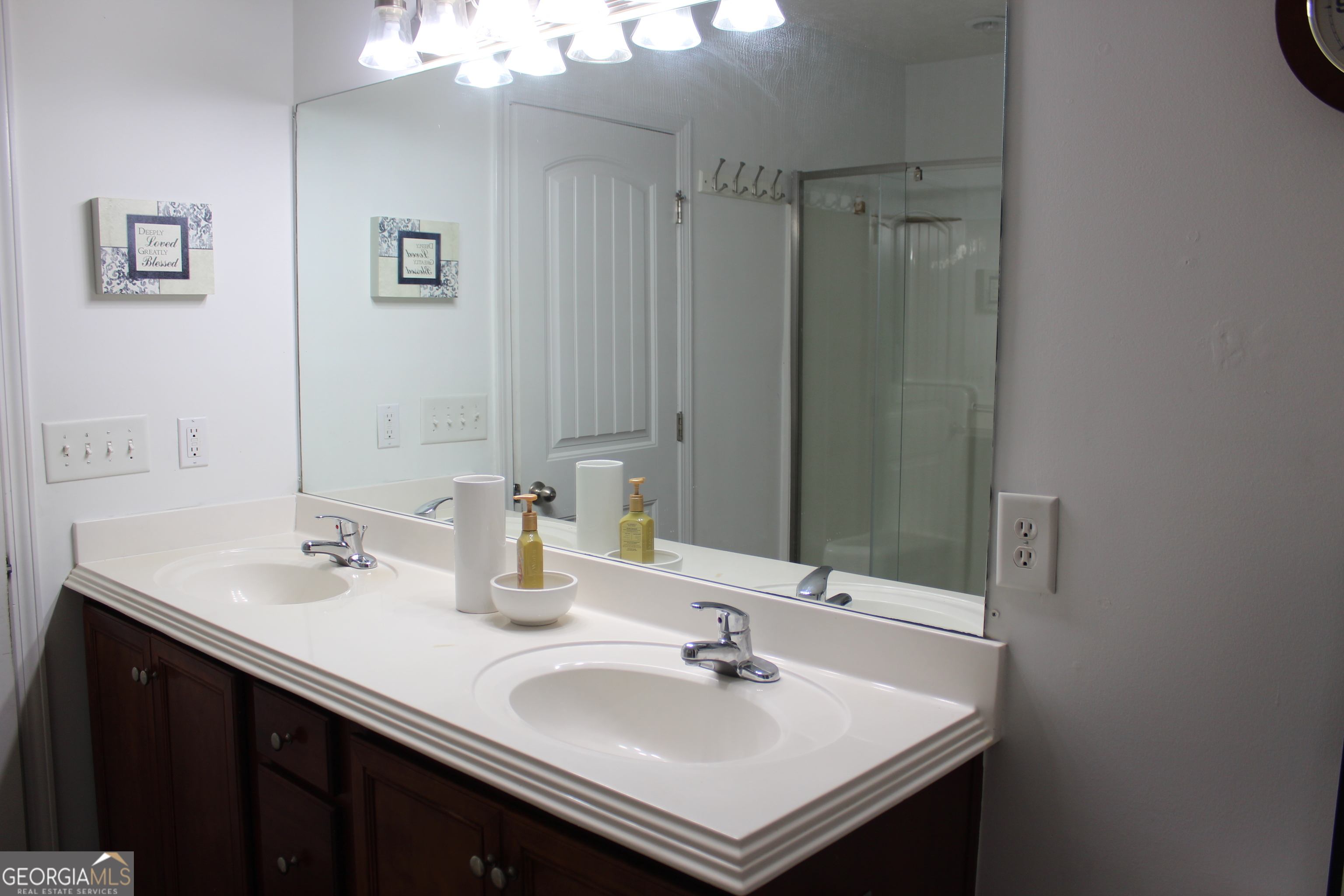 33 Lee Road Phenix City, AL 36870 - Photo 24 of 47 a bathroom with a sink and a mirror