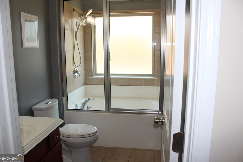 33 Lee Road Phenix City, AL 36870 - Photo 31 of 47 a bathroom with a sink and a toilet