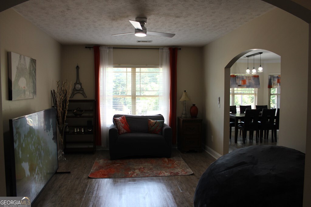 33 Lee Road Phenix City, AL 36870 - Photo 5 of 47 a living room with furniture and a fireplace