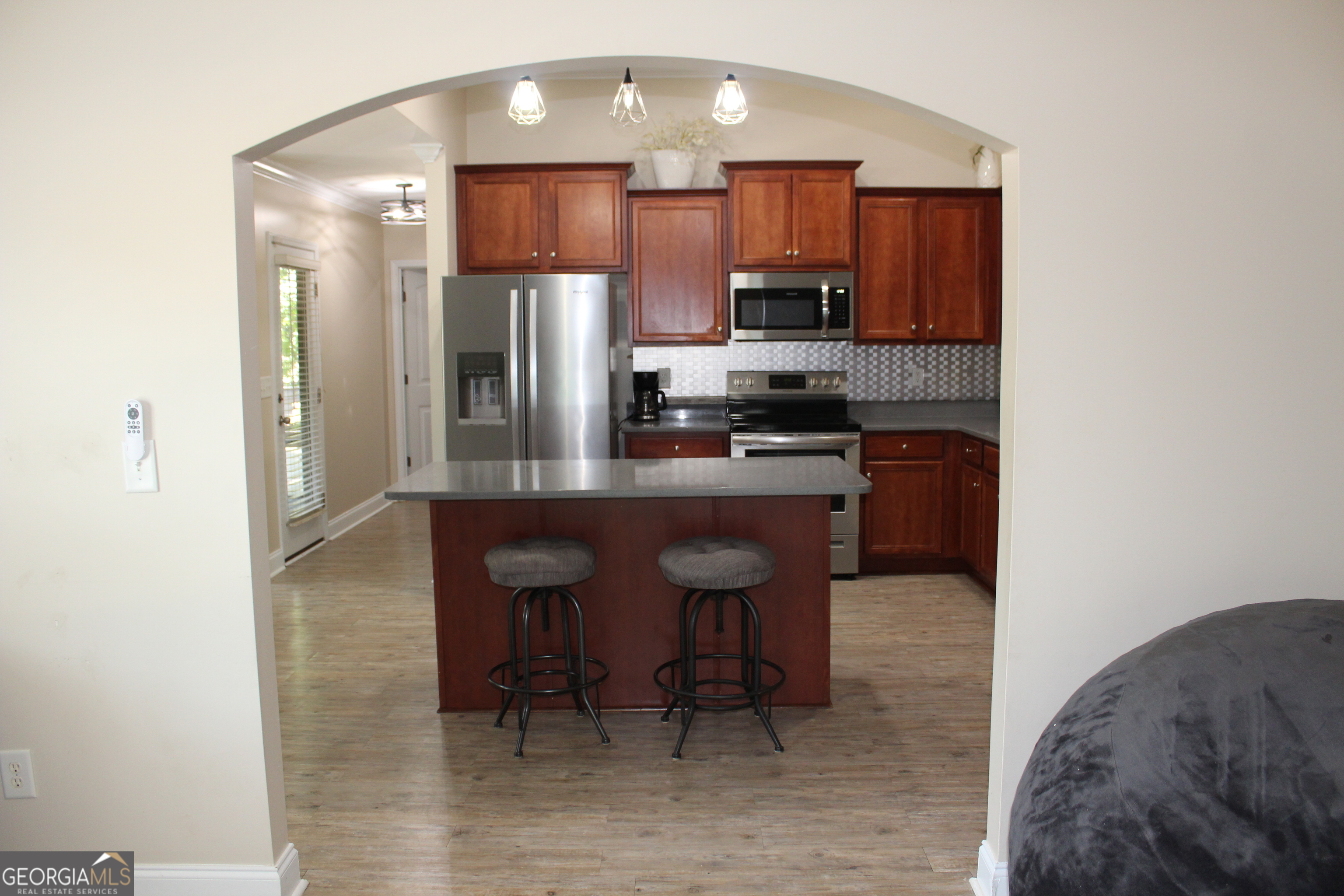 33 Lee Road Phenix City, AL 36870 - Photo 6 of 47 a kitchen with stainless steel appliances a sink stove and refrigerator