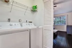 a bathroom with a toilet and a bath tub
