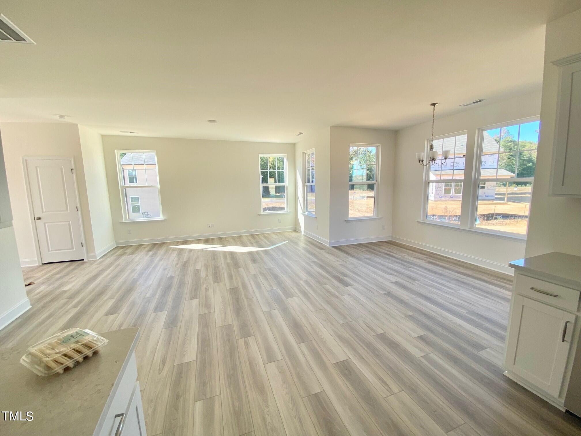 39 Flowing River Road, Unit 43 Angier, NC 27501 - Photo 7 of 23 View from Center of Kitchen