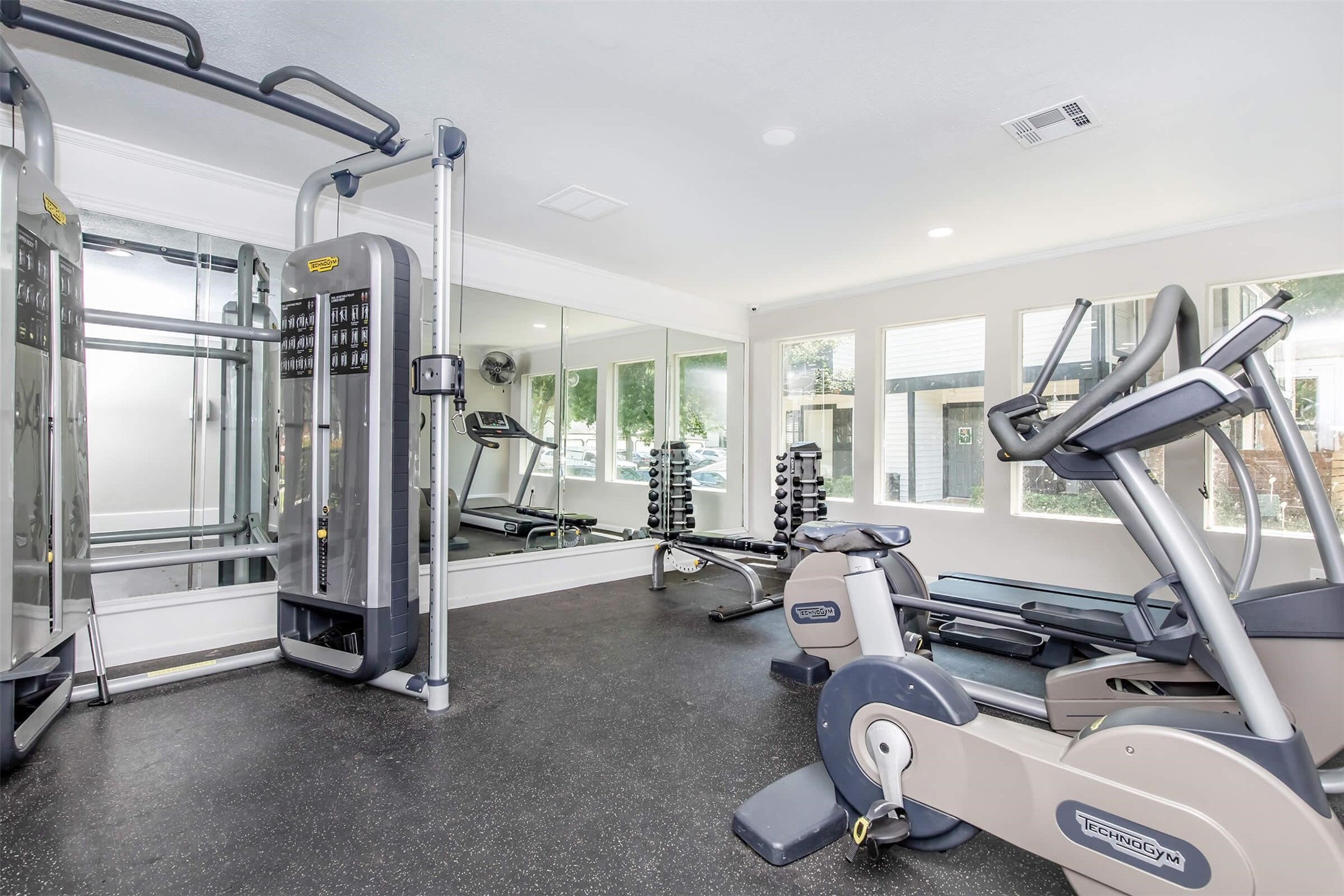18001 Cypress Trace Road, Unit 506 Houston, TX 77090 - Photo 18 of 32 a view of a room with gym equipment