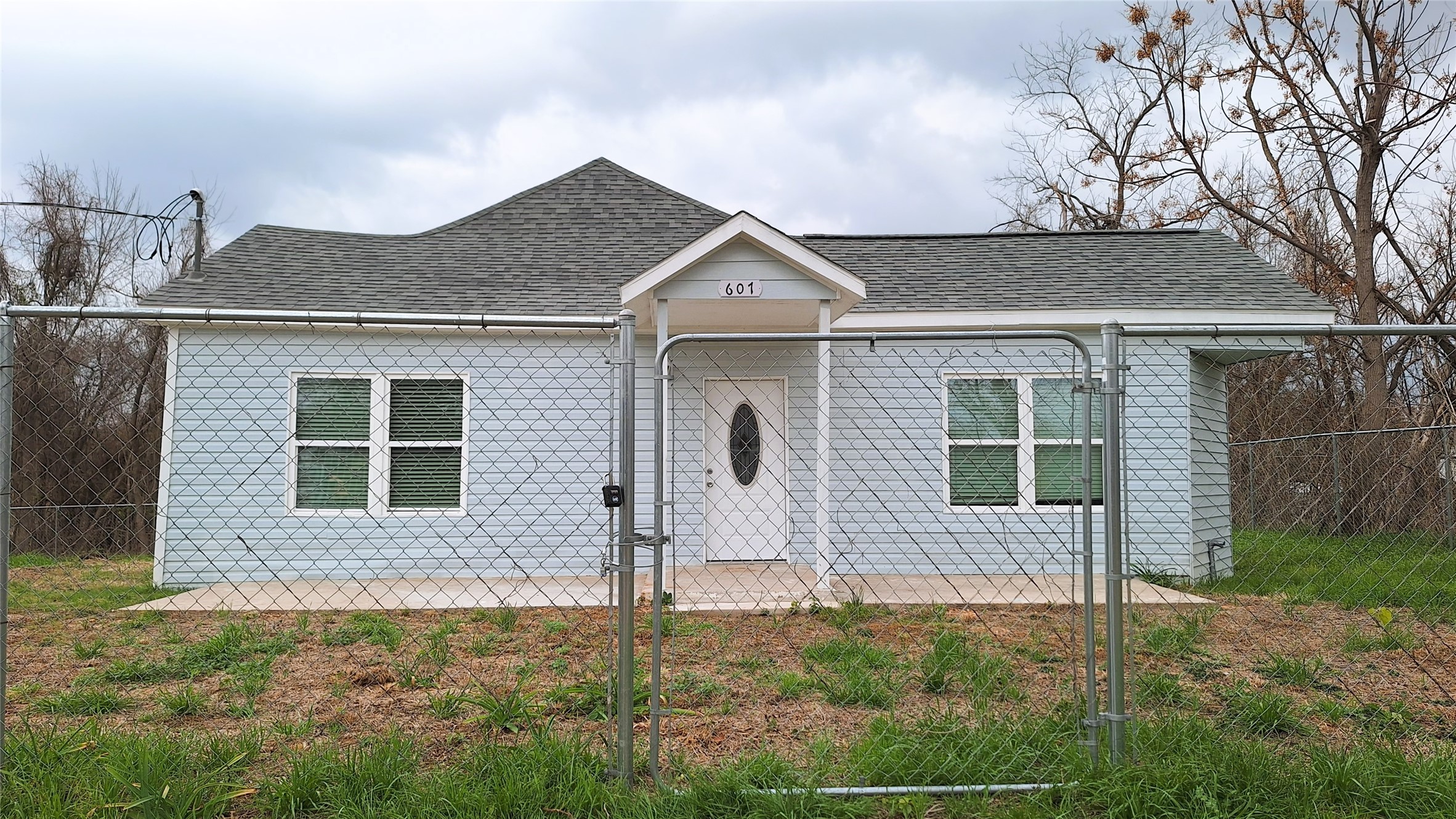 front view of a house with a yard