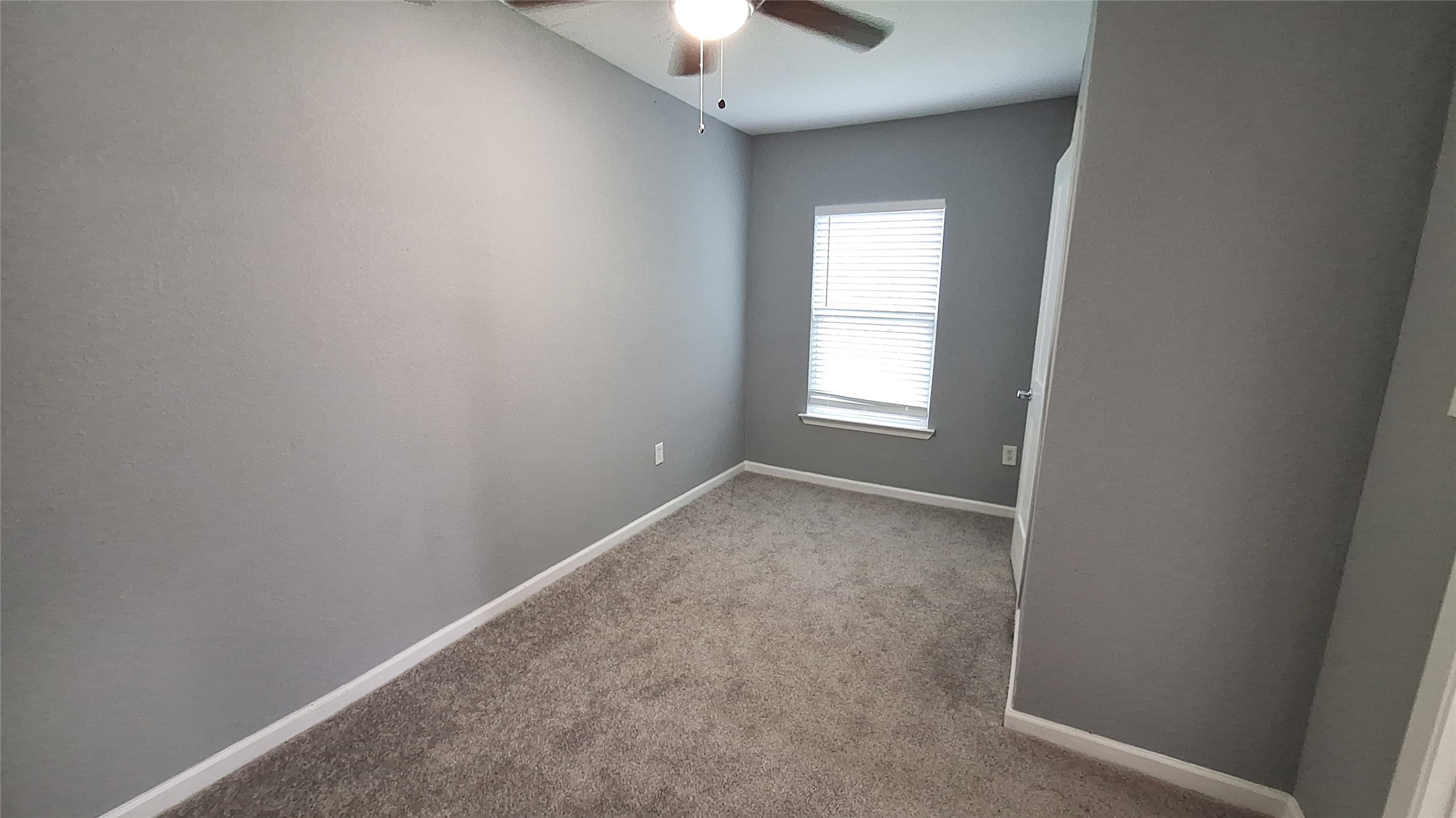 601 Armstrong Somerville, TX 77879 - Photo 20 of 28 an empty room that has a window in it