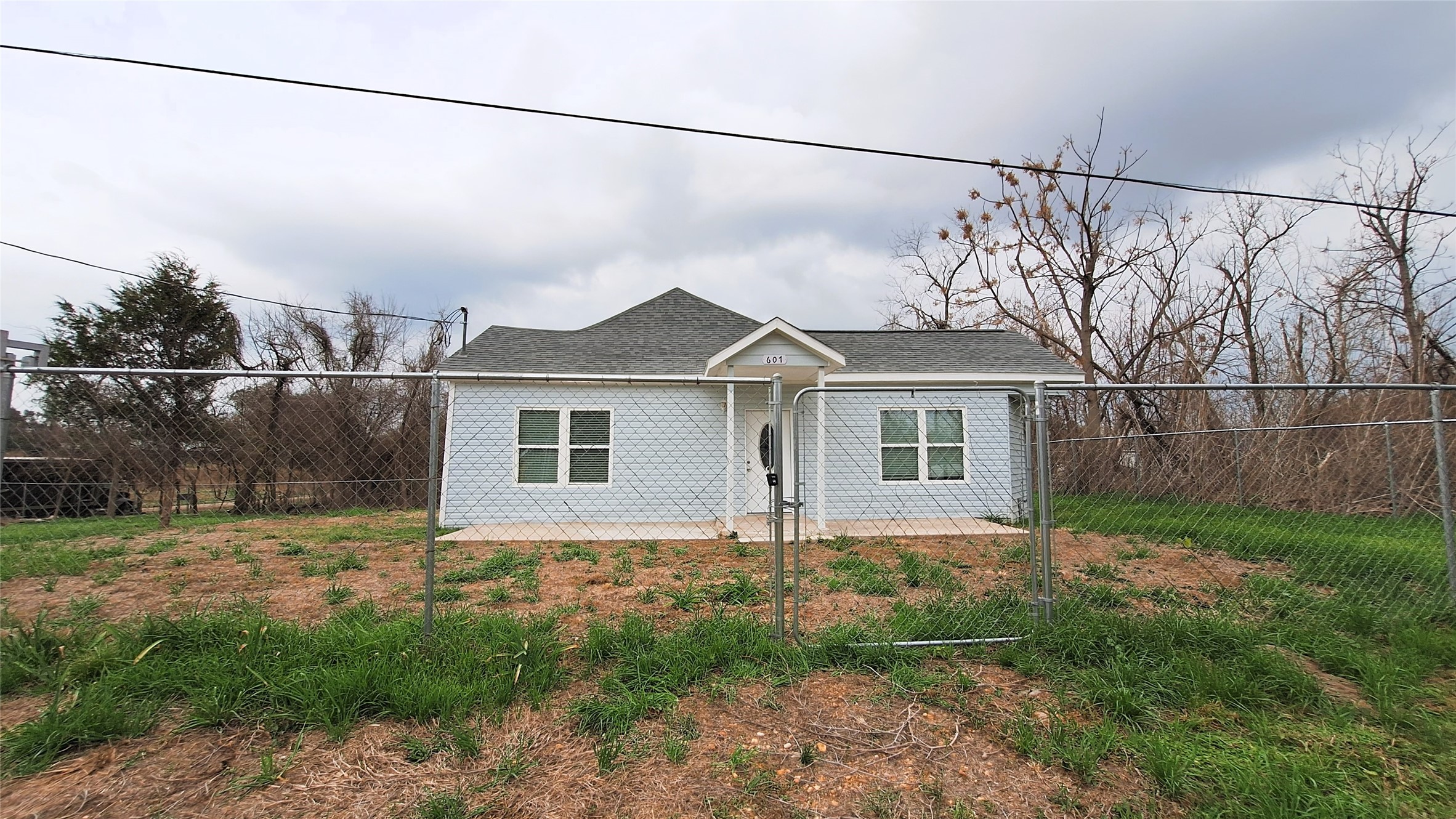 601 Armstrong Somerville, TX 77879 - Photo 2 of 28 a view of a house with a yard