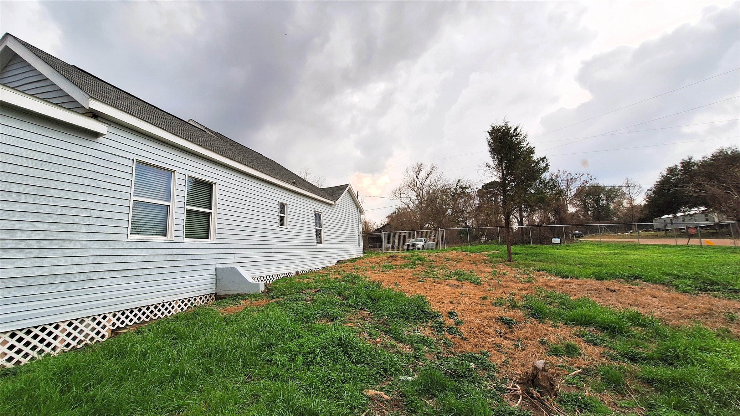 601 Armstrong Somerville, TX 77879 - Photo 26 of 28 a backyard of a house with lots of green space