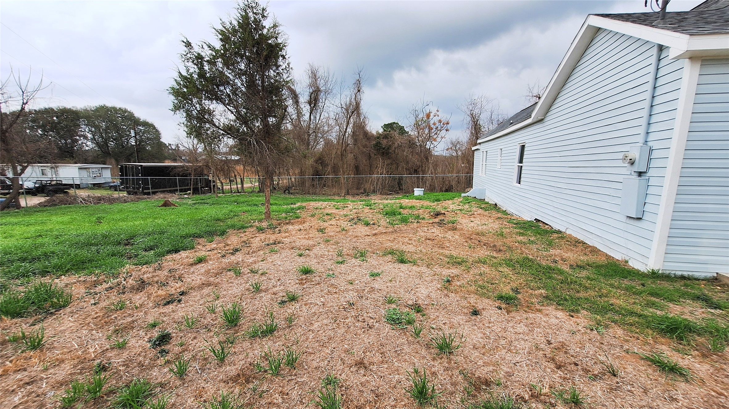 601 Armstrong Somerville, TX 77879 - Photo 27 of 28 a backyard of a house with lots of green space