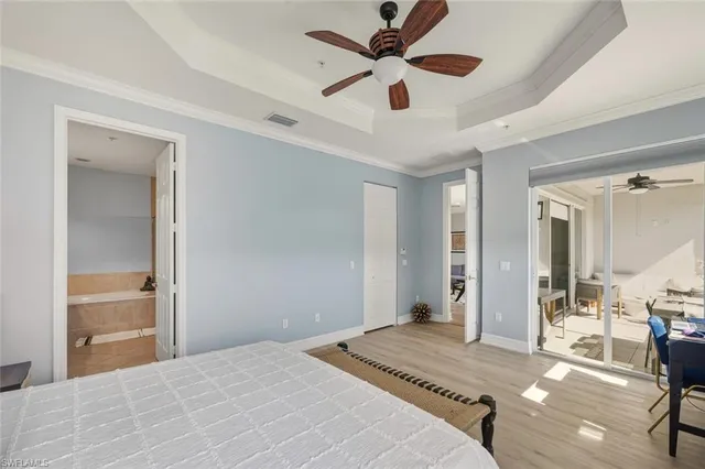 a bathroom with a sink and mirror with toilet