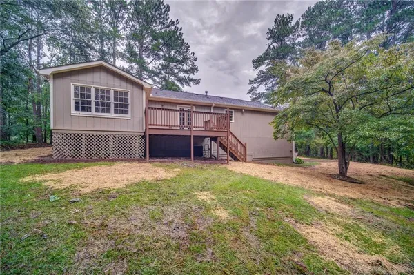 a house view with a backyard space