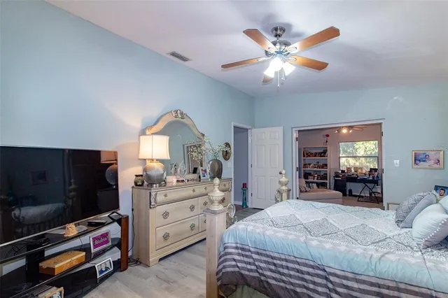 a bedroom with a bed and furniture