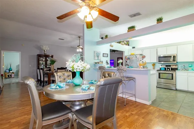 a view of a dining room with furniture