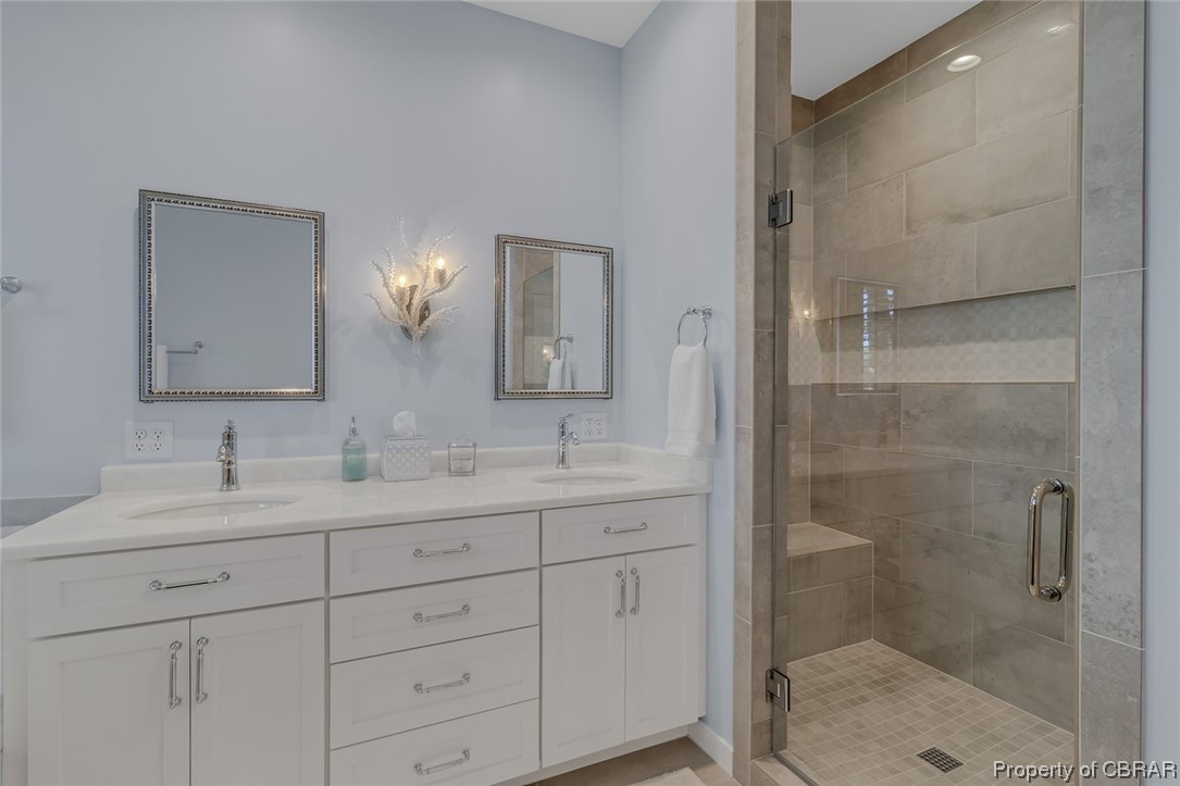 192 Bayberry Point Lane Kilmarnock, VA 22482 - Photo 37 of 49 Bathroom featuring mirror, a shower with shower door, and double large???????????????????????????????? vanity